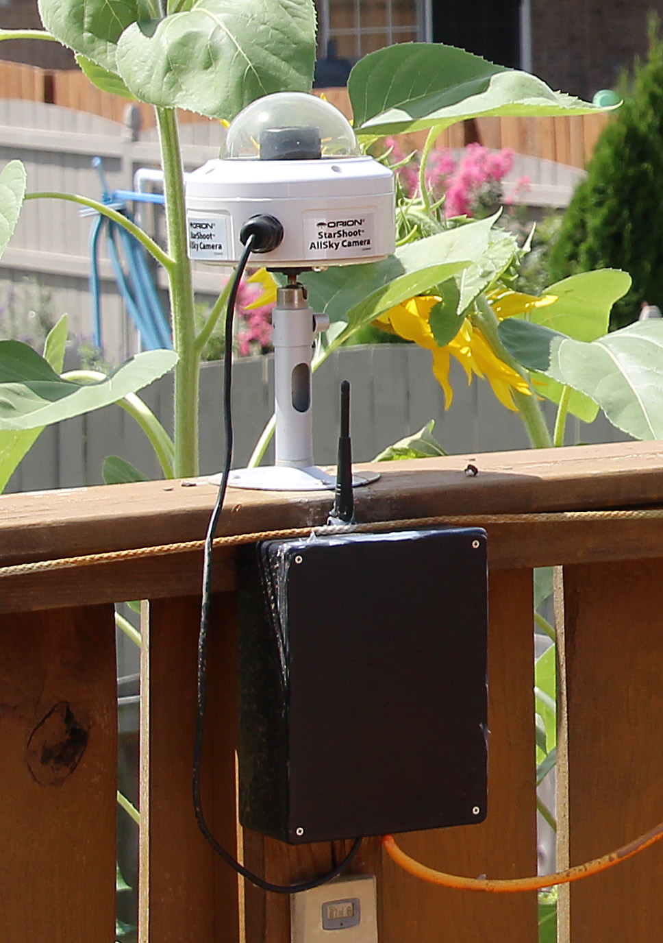 Close-up of the AllSky camera on my observing deck. Video transmitter in the black box below the camera. 