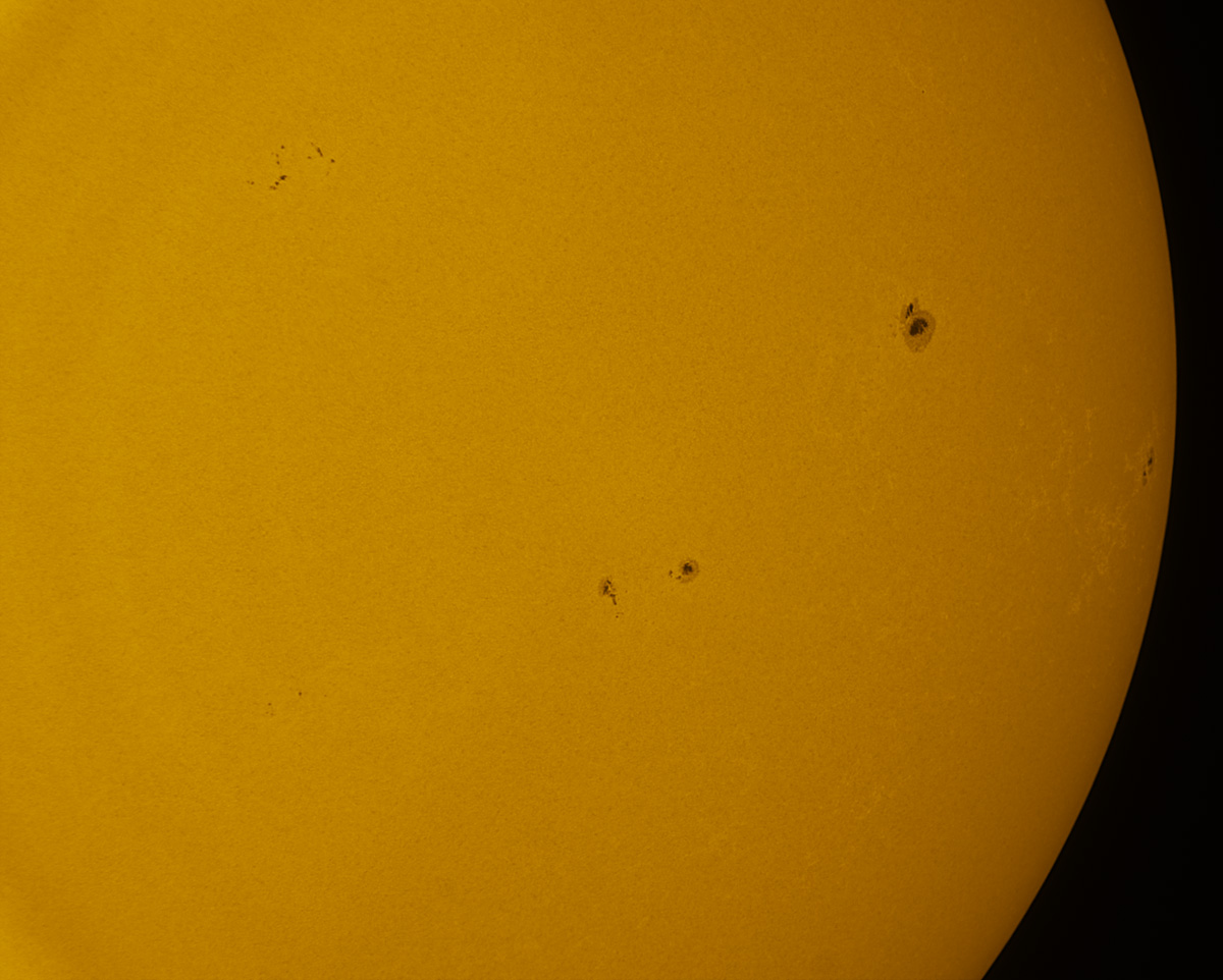 Sunspots 1818, 1824, and 1825 in white light 08/18/2013