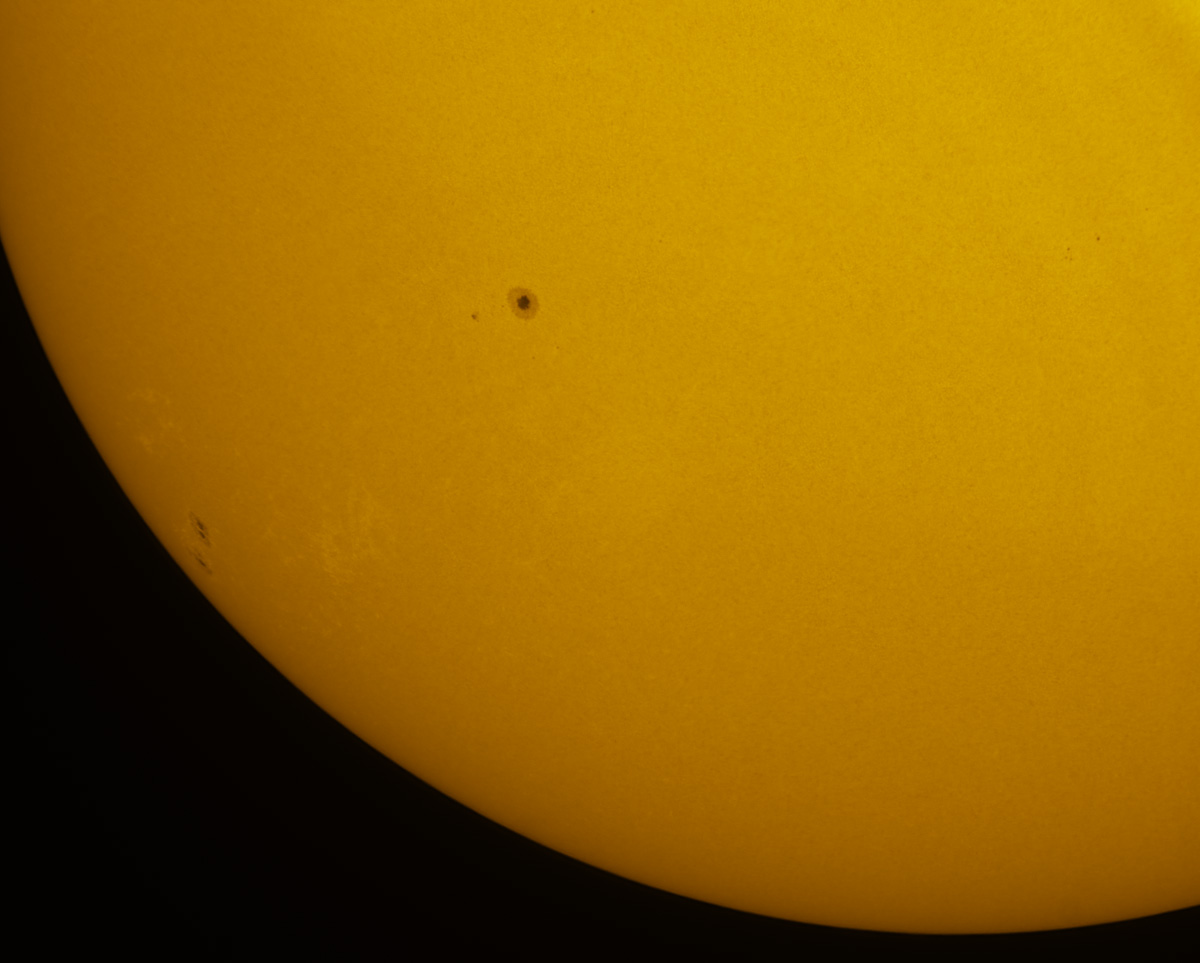 Sunspots 1823 and 1827 in white light 08/18/2013