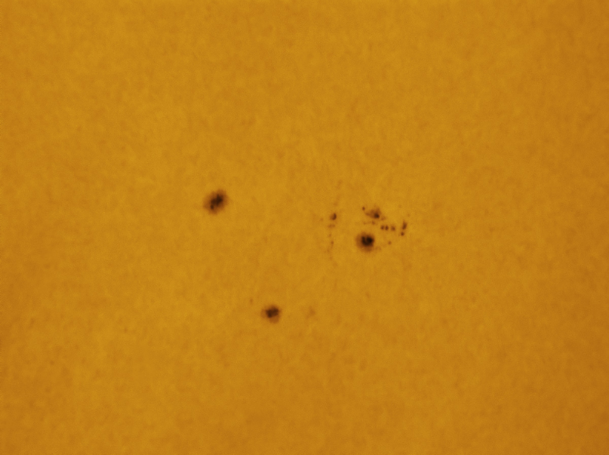 Sunspots 1633 and 1634 in white light 12/21/2012